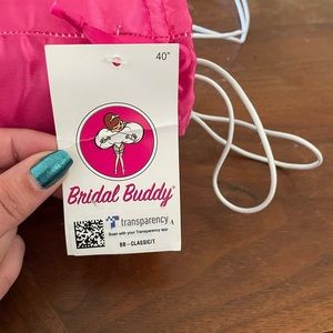 Bridal Buddy never used.  To wear under a ballgown or a-line wedding dress